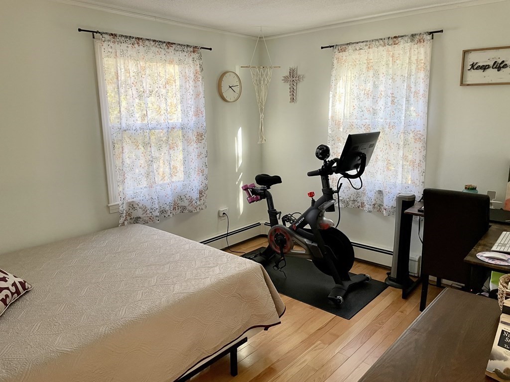 4 Vine Street Webster, MA 01570 - Photo 17 of 19 a bed room with two beds and a chair