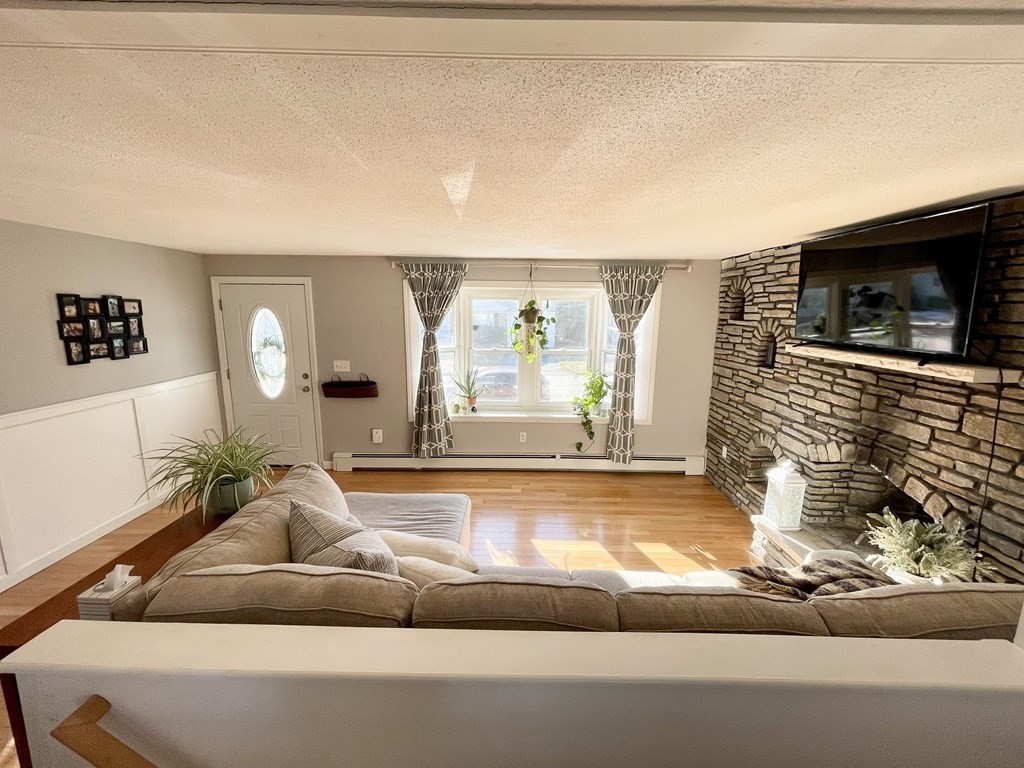 4 Vine Street Webster, MA 01570 - Photo 7 of 19 a living room with furniture