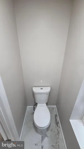 a bathroom with a toilet