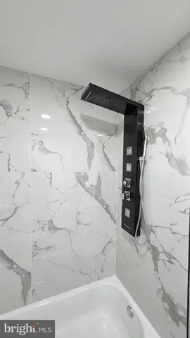 a view of a livingroom with wooden floor