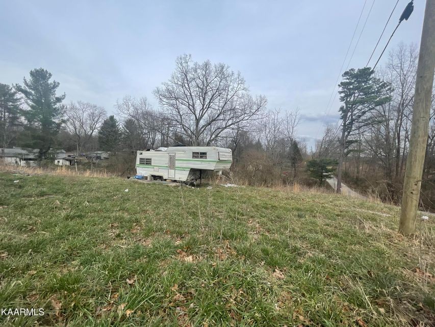 905 Harding Road Jamestown, TN 38556 - Photo 8 of 9 a view of a house with a yard