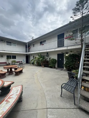 a view of a terrace with chairs