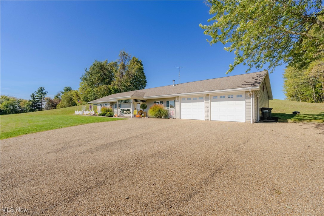 90480 Kilgore Ridge Road Scio, OH 43988 - Photo 4 of 39 Ranch-style house with a garage, a front lawn, and driveway