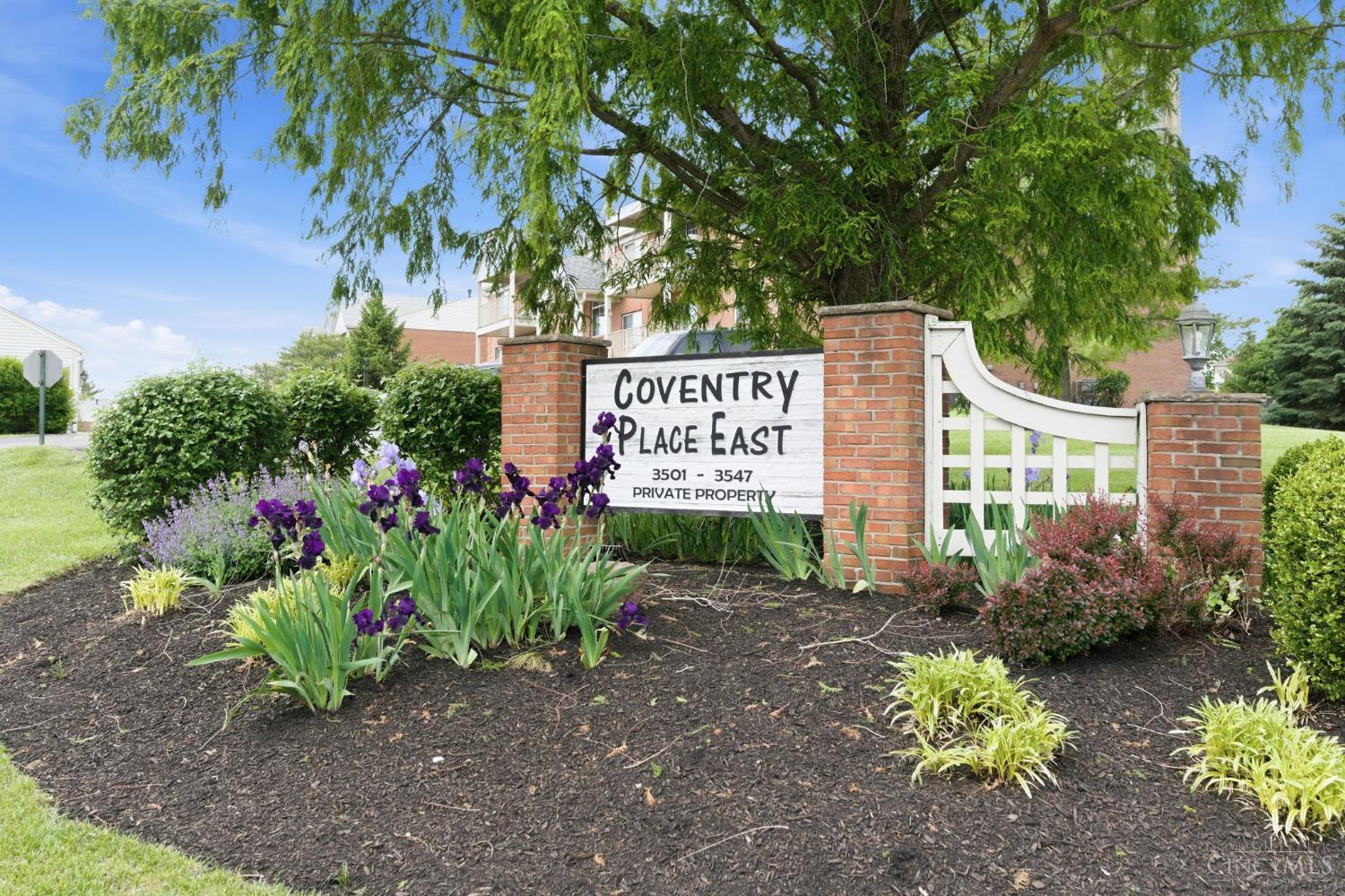 3543 Jessup Road, Unit 2B Cincinnati, OH 45239 - Photo 26 of 31 Coventry Place community entrance with attractive landscaping and neighborhood appeal