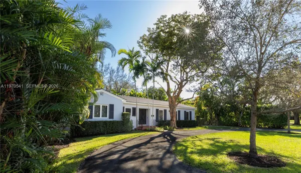 a view of a garden with a fountain