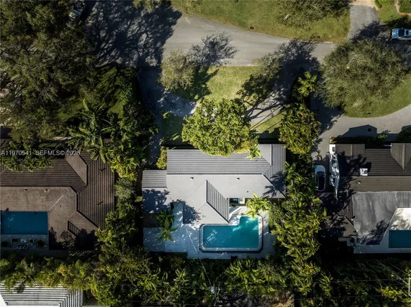 front view of a house with a garden