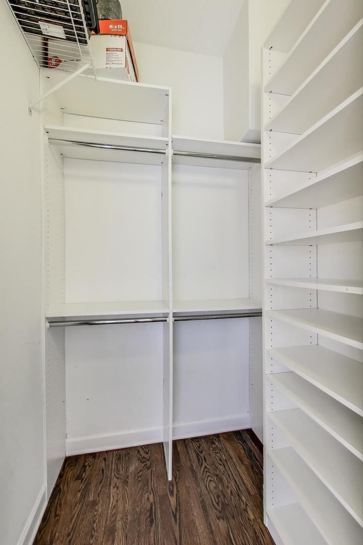 1332 West Madison Street, Unit 4E Chicago, IL 60607 - Photo 11 of 12 a view of walk in closet with empty racks