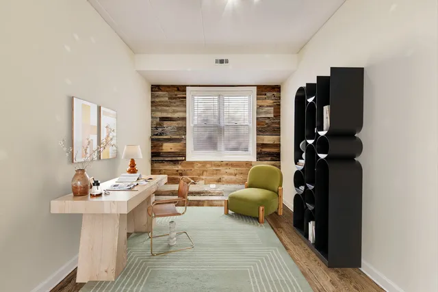 a living room with furniture and window