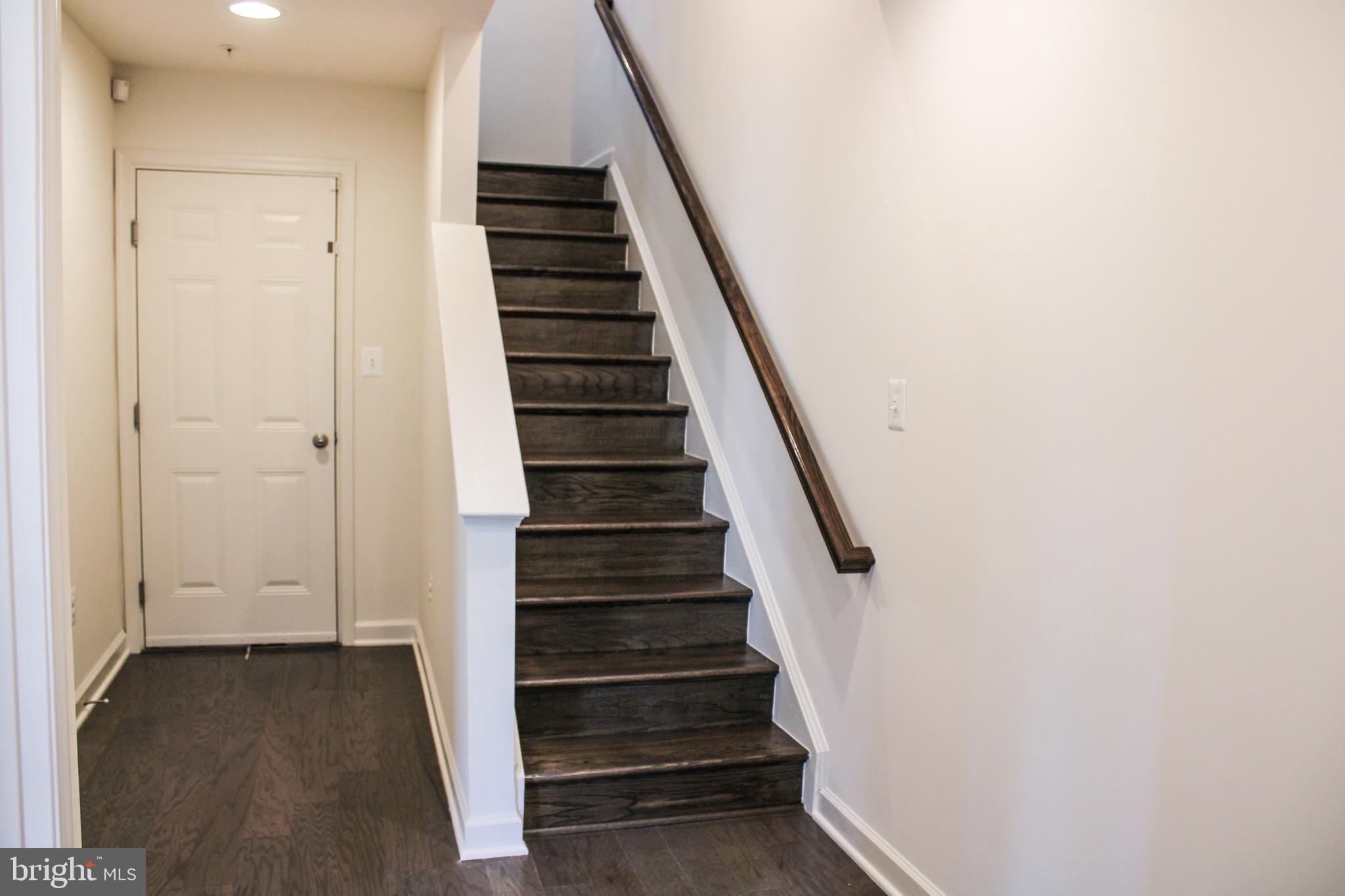 9914 Wood Edge Way Lanham, MD 20706 - Photo 19 of 67 a view of entryway with wooden floor
