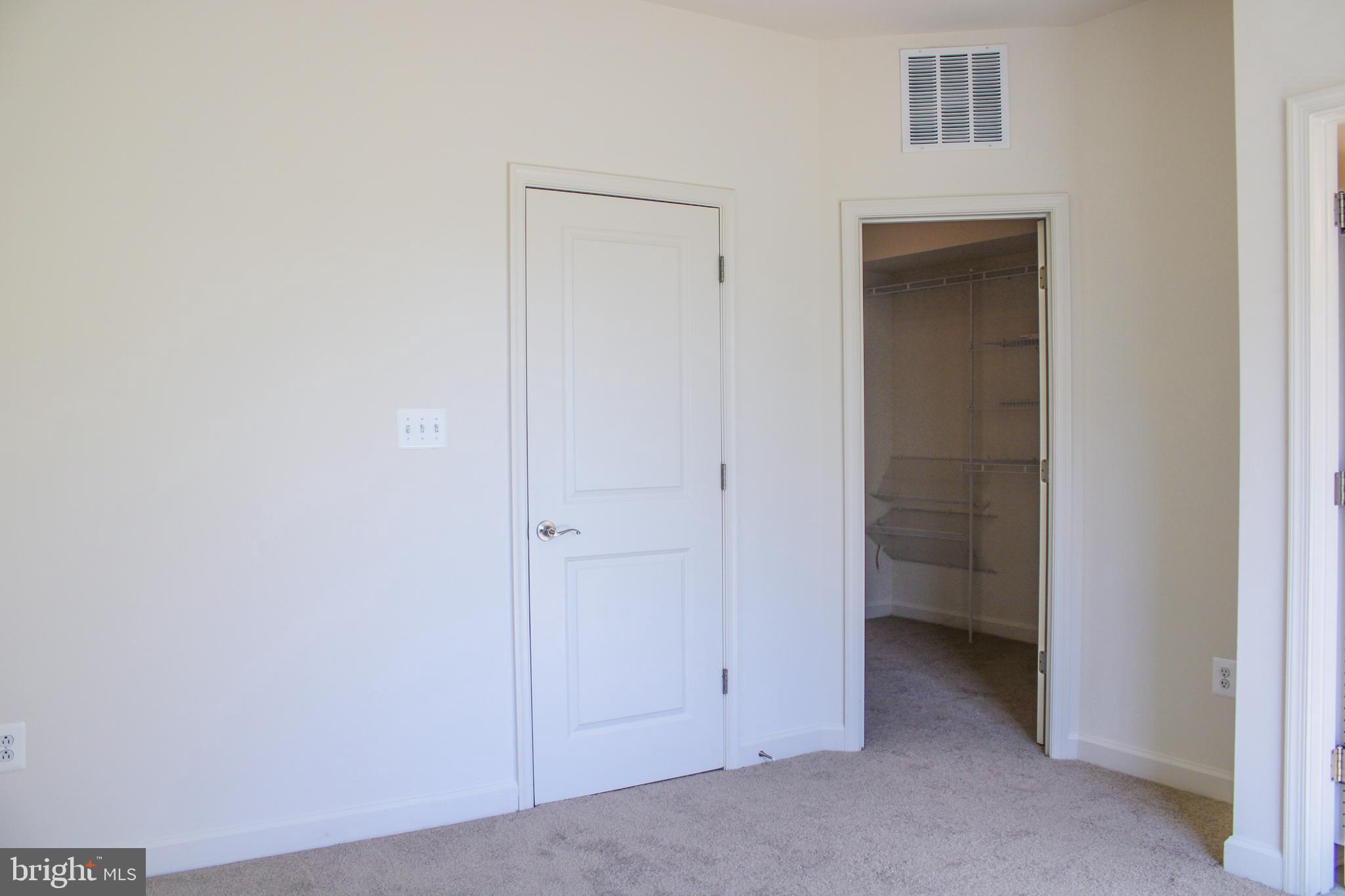 9914 Wood Edge Way Lanham, MD 20706 - Photo 39 of 67 a view of an empty room