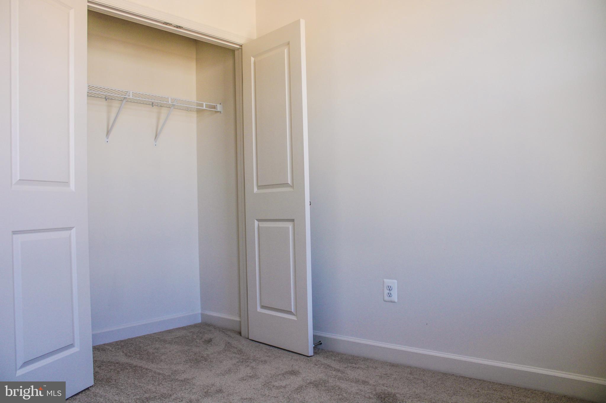 9914 Wood Edge Way Lanham, MD 20706 - Photo 51 of 67 a view of an empty room