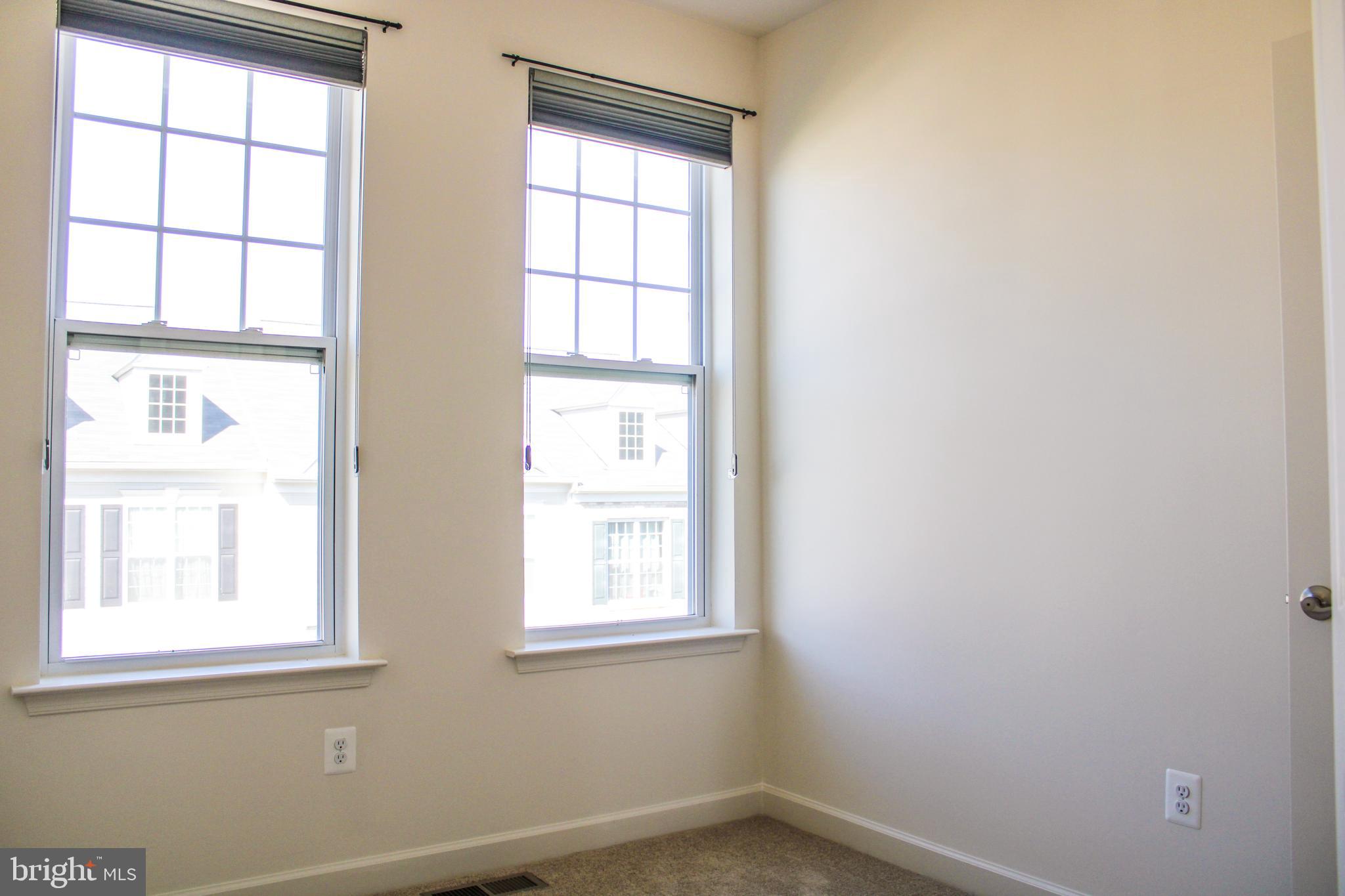 9914 Wood Edge Way Lanham, MD 20706 - Photo 53 of 67 an empty room with a window