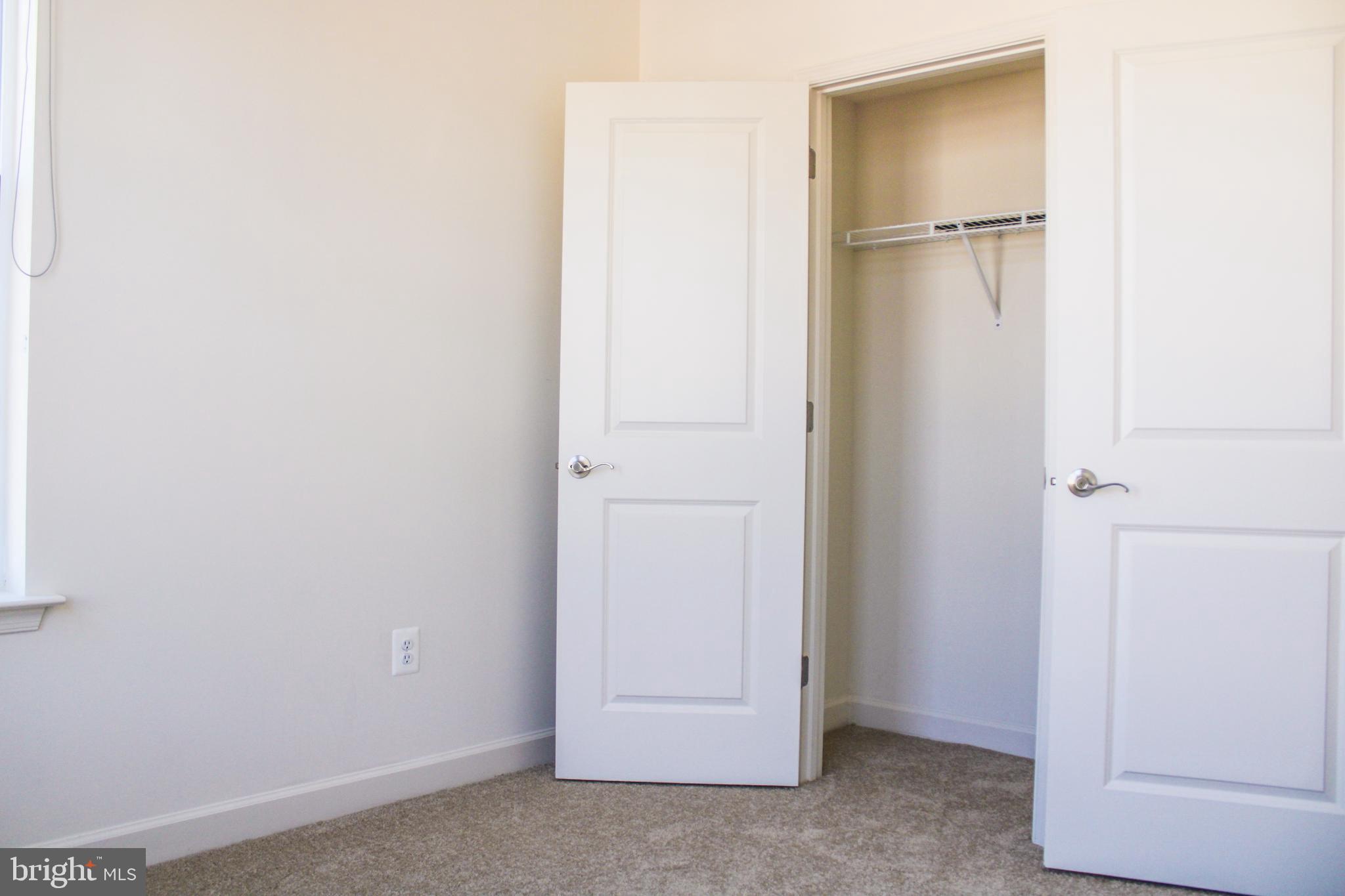 9914 Wood Edge Way Lanham, MD 20706 - Photo 56 of 67 a view of an empty room