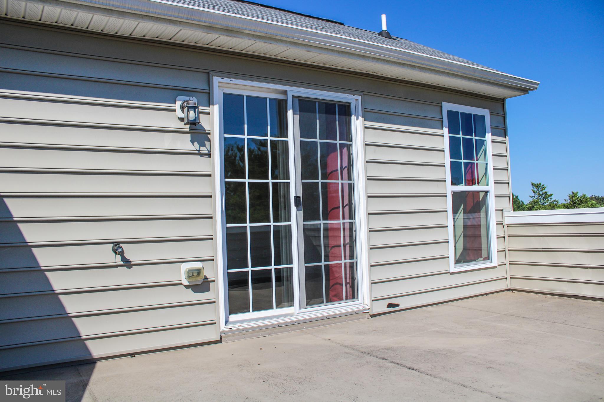 9914 Wood Edge Way Lanham, MD 20706 - Photo 65 of 67 a view of a house with a window