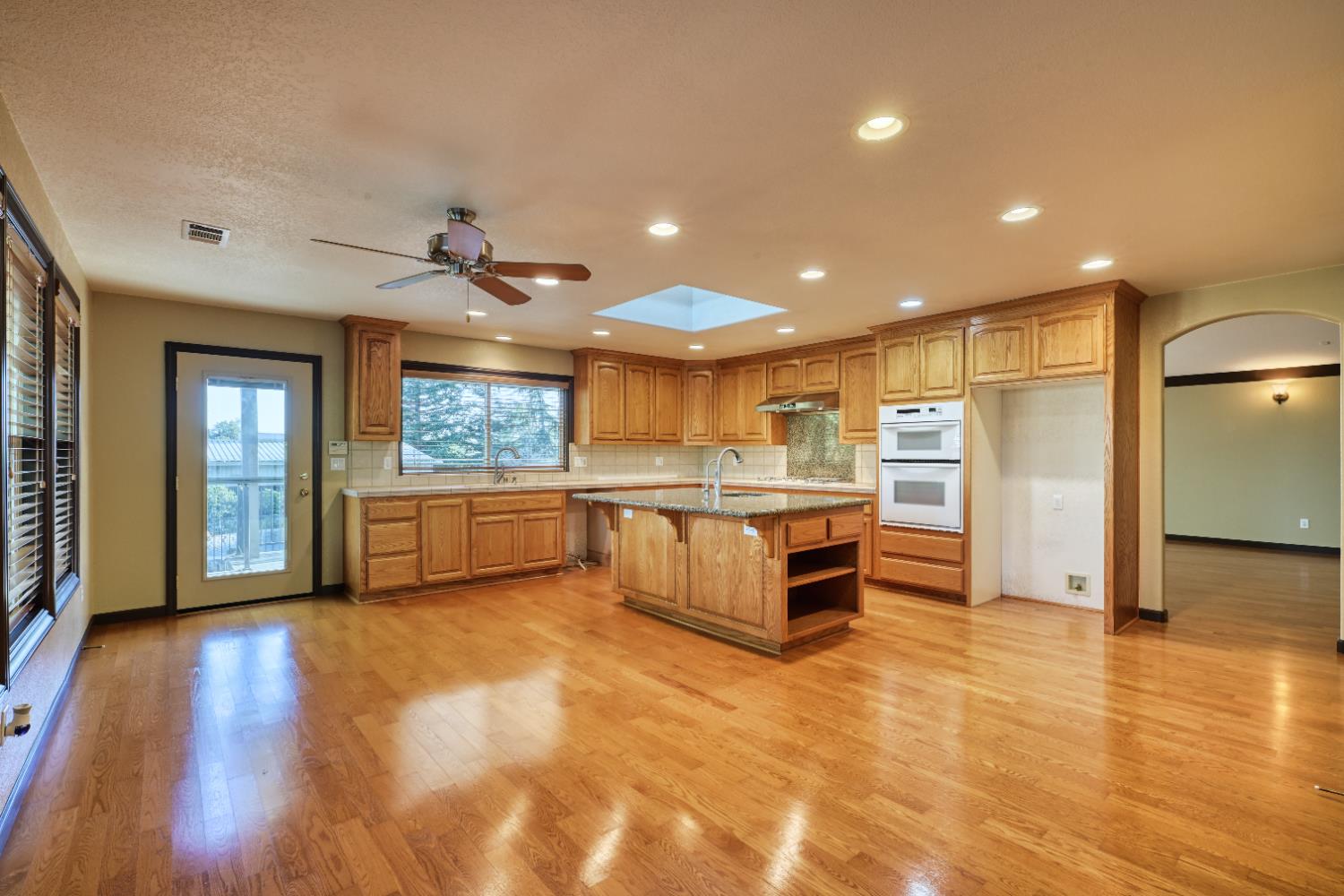 4841 Val Verde Road Loomis, CA 95650 - Photo 32 of 99 a large kitchen with a lot of counter space and stainless steel appliances