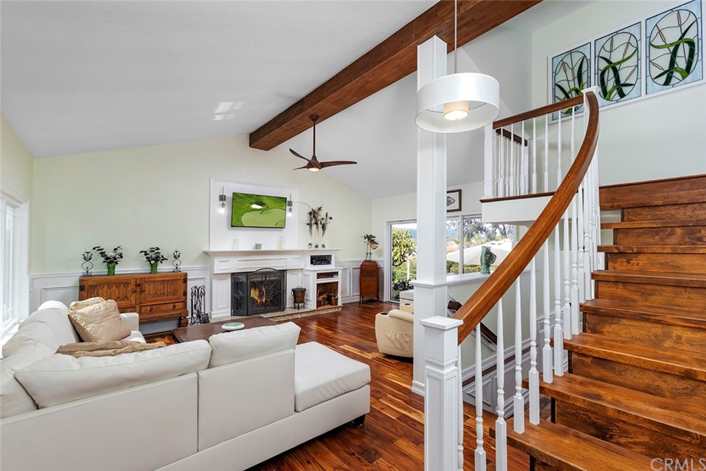 23965 Leeward Drive Dana Point, CA 92629 - Photo 11 of 27 a living room with furniture and a fireplace
