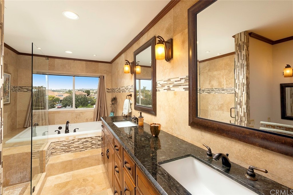 23965 Leeward Drive Dana Point, CA 92629 - Photo 16 of 27 a large kitchen with kitchen island a large window in it