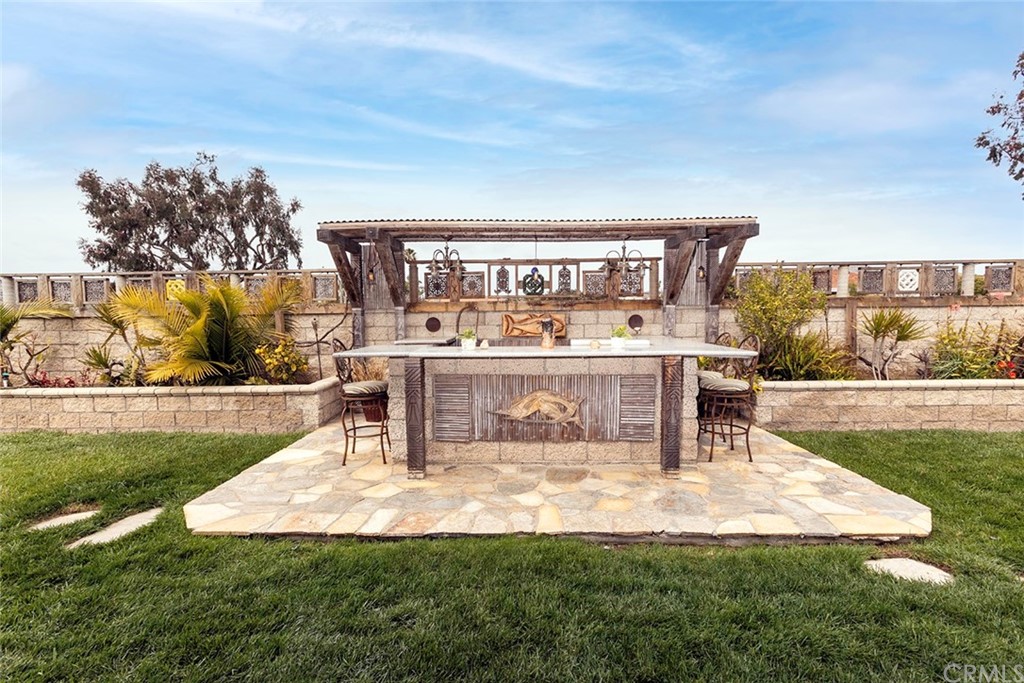 23965 Leeward Drive Dana Point, CA 92629 - Photo 20 of 27 a view of a swimming pool with an outdoor seating