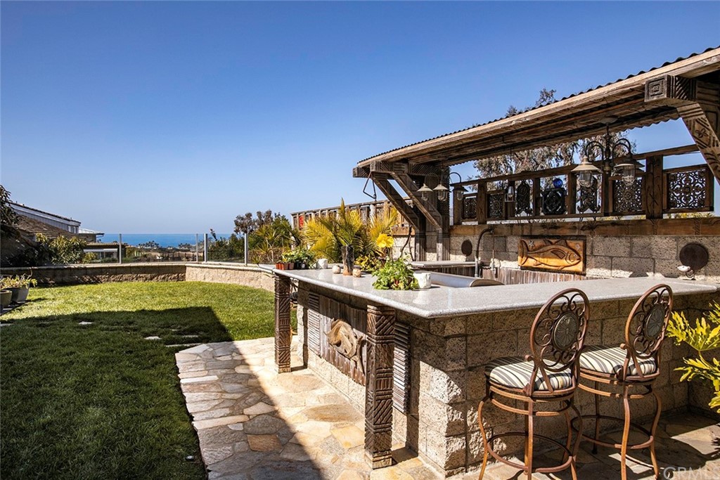 23965 Leeward Drive Dana Point, CA 92629 - Photo 21 of 27 a view of swimming pool with outdoor seating and deck