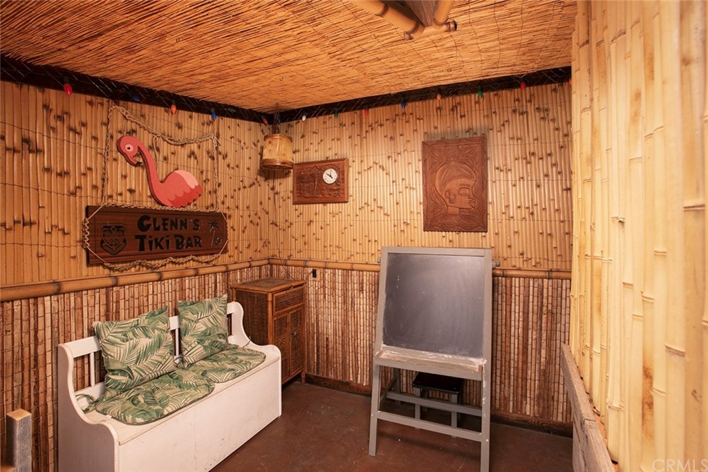 23965 Leeward Drive Dana Point, CA 92629 - Photo 24 of 27 a bedroom with a bed and a chair