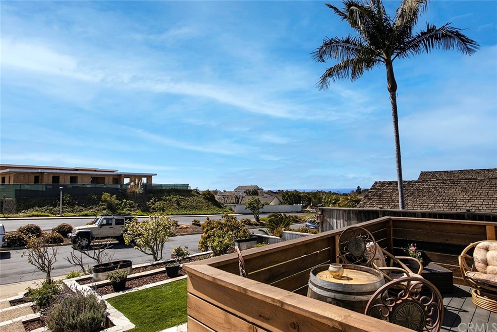 23965 Leeward Drive Dana Point, CA 92629 - Photo 26 of 27 a view of a balcony with chairs and potted plants