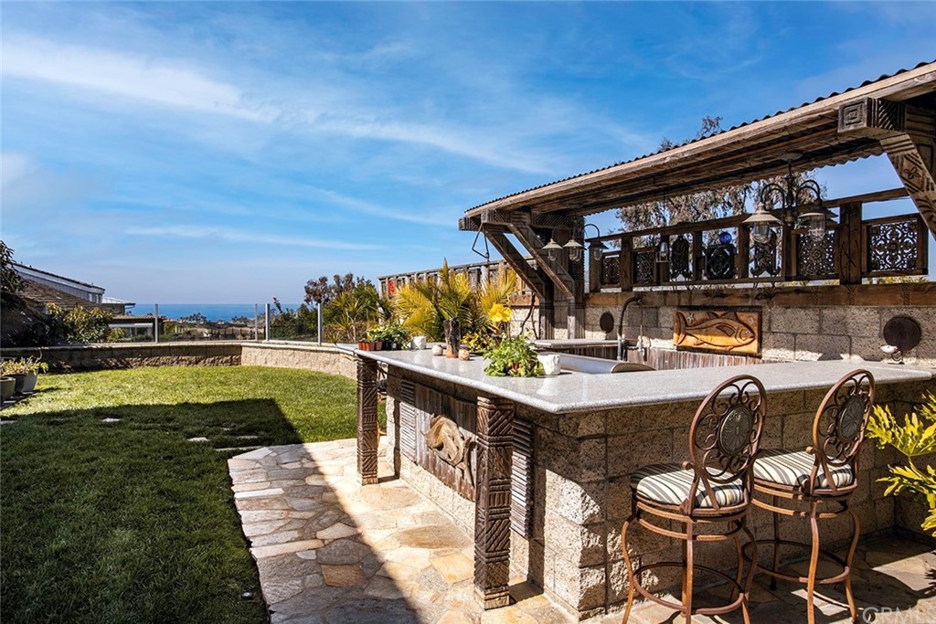 23965 Leeward Drive Dana Point, CA 92629 - Photo 27 of 27 a view of swimming pool with outdoor seating
