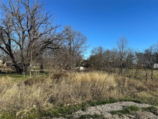 a view of lake with green space