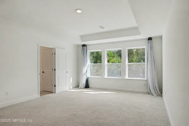 a bathroom with a sink double vanity and a mirror