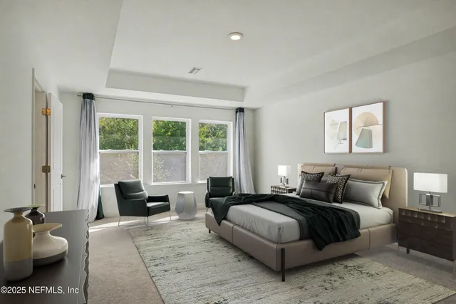 a bathroom with a double vanity sink a shower and a mirror