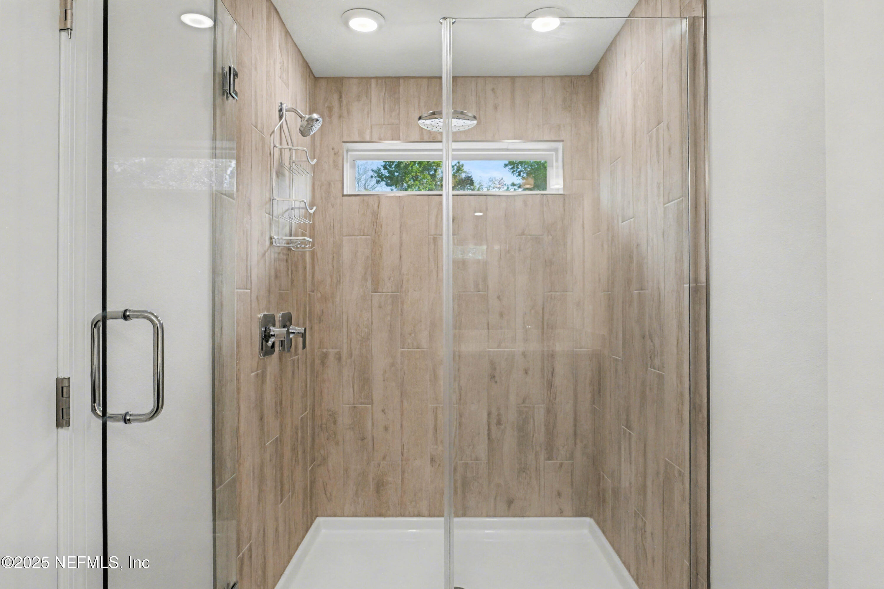 111 Windswept Way St. Augustine, FL 32092 - Photo 26 of 63 a bathroom with a shower