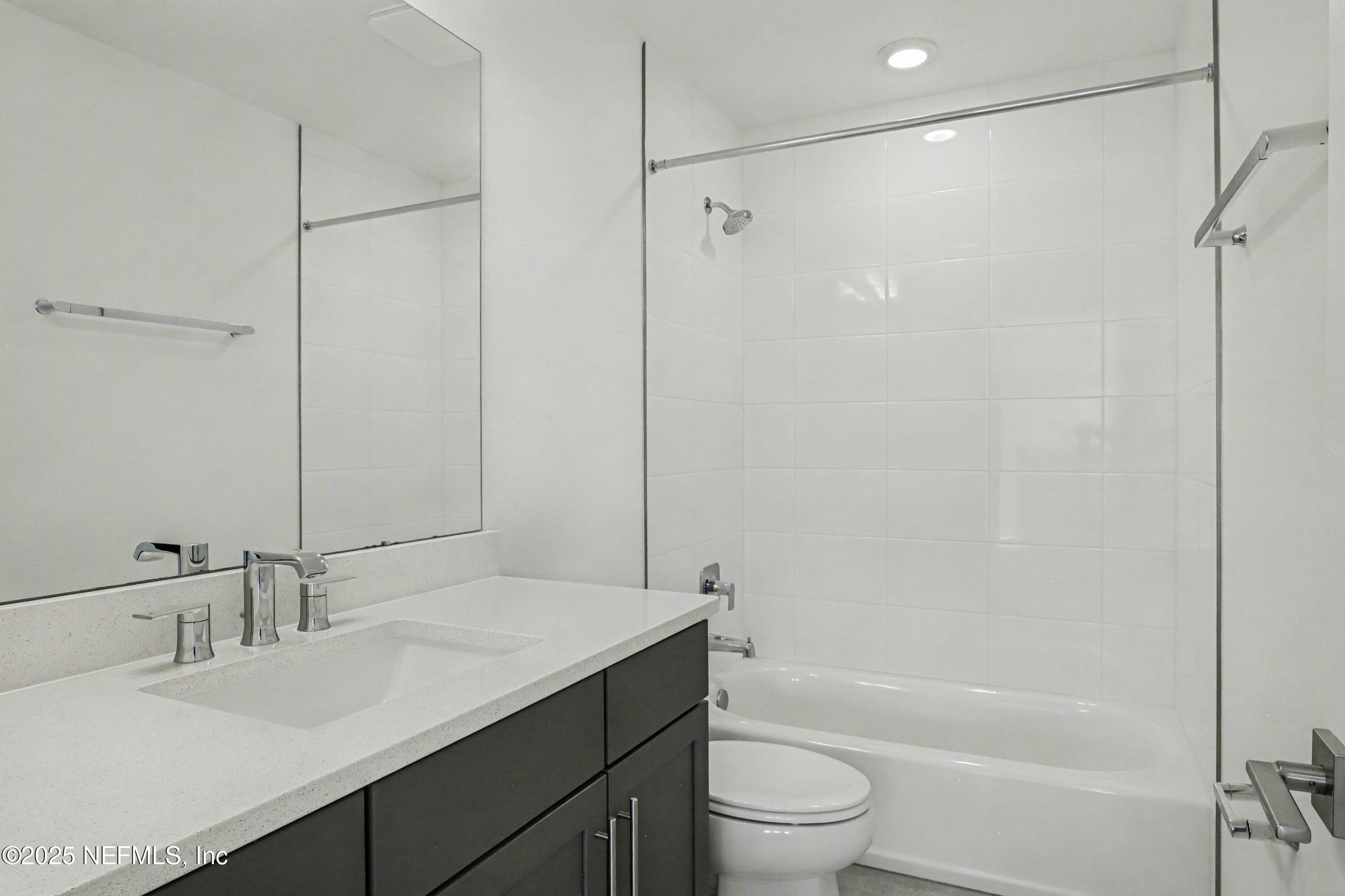 111 Windswept Way St. Augustine, FL 32092 - Photo 33 of 63 a bathroom with a granite countertop sink toilet and shower