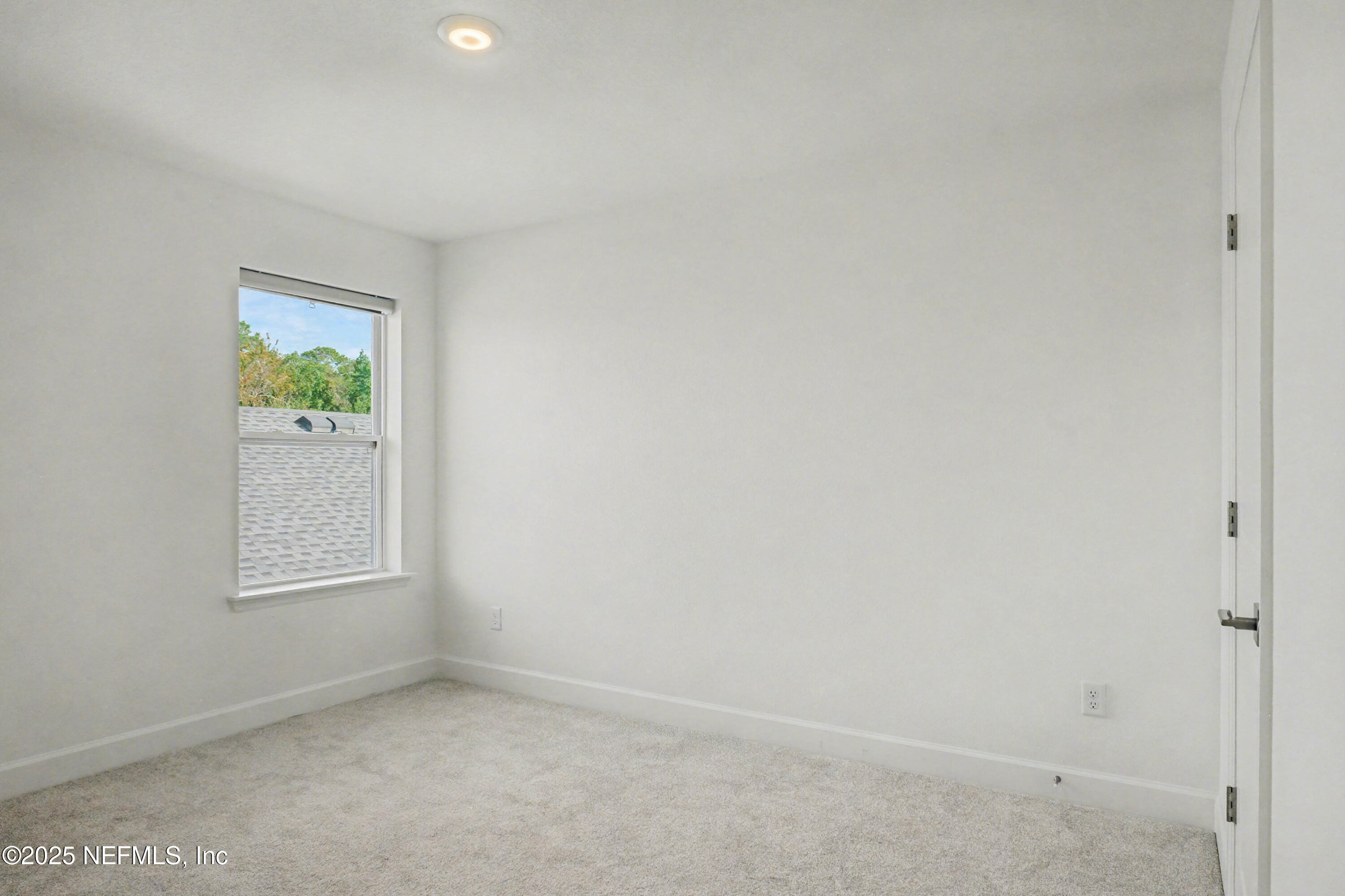 111 Windswept Way St. Augustine, FL 32092 - Photo 35 of 63 an empty room with windows