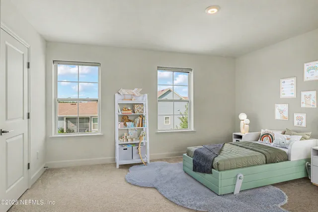 a view of an empty room with closet