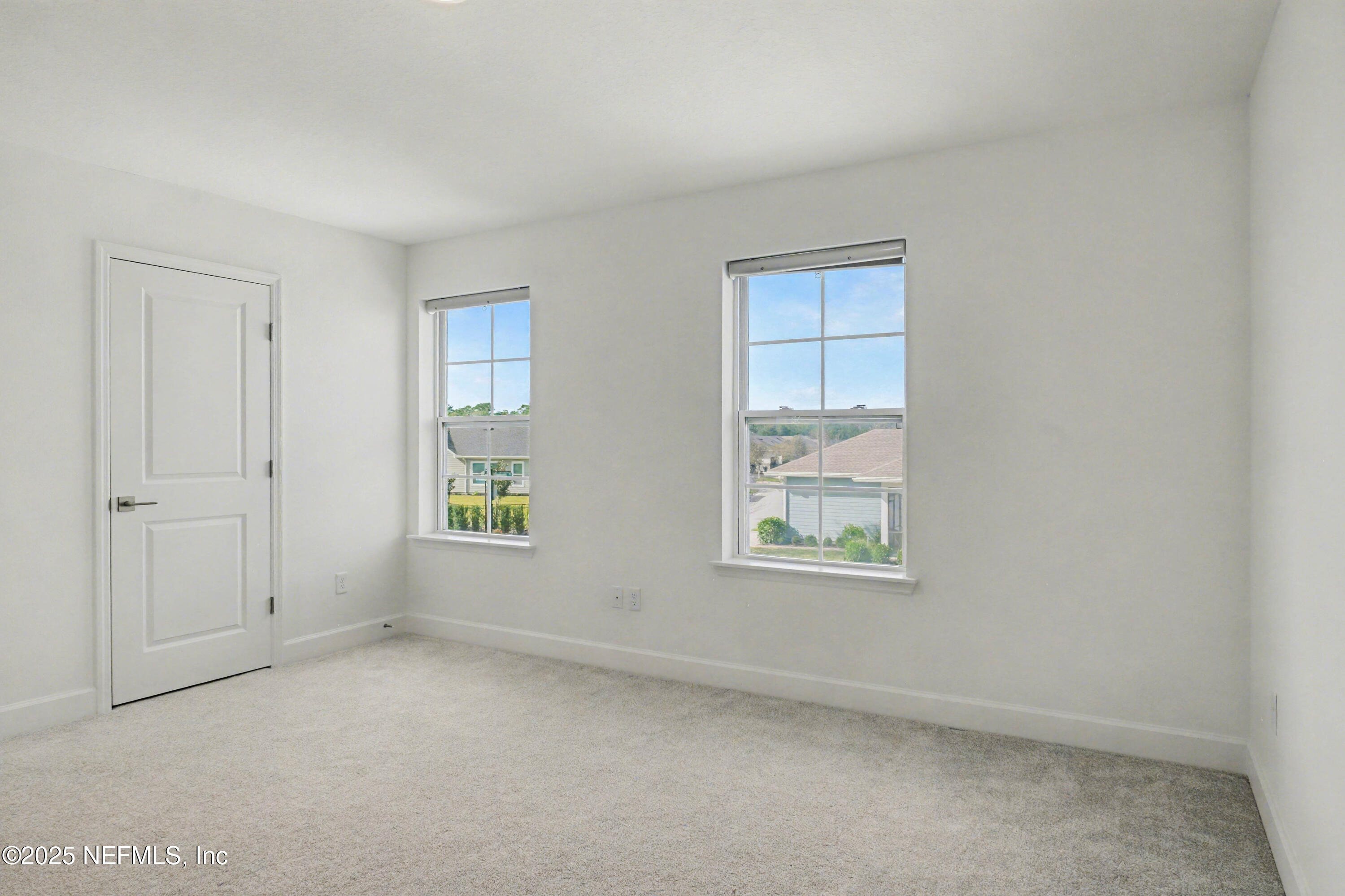 111 Windswept Way St. Augustine, FL 32092 - Photo 37 of 63 an empty room with a window