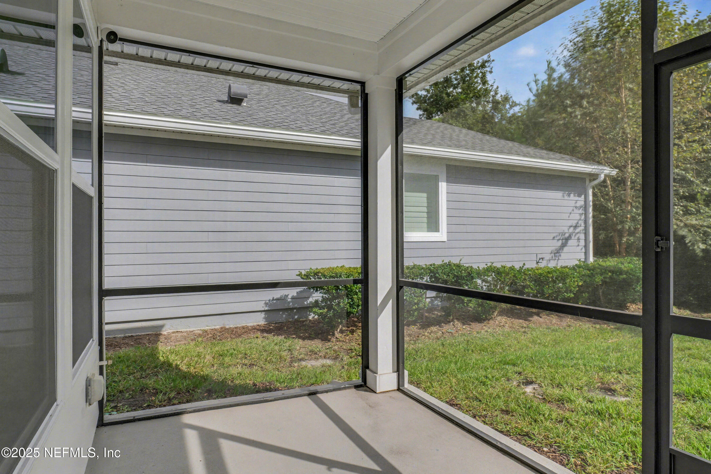 111 Windswept Way St. Augustine, FL 32092 - Photo 44 of 63 a view of a backyard of the house