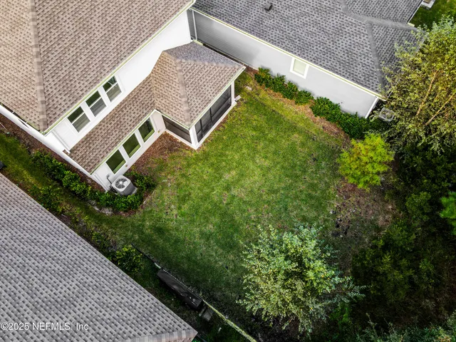 a view of yard with an outdoor seating