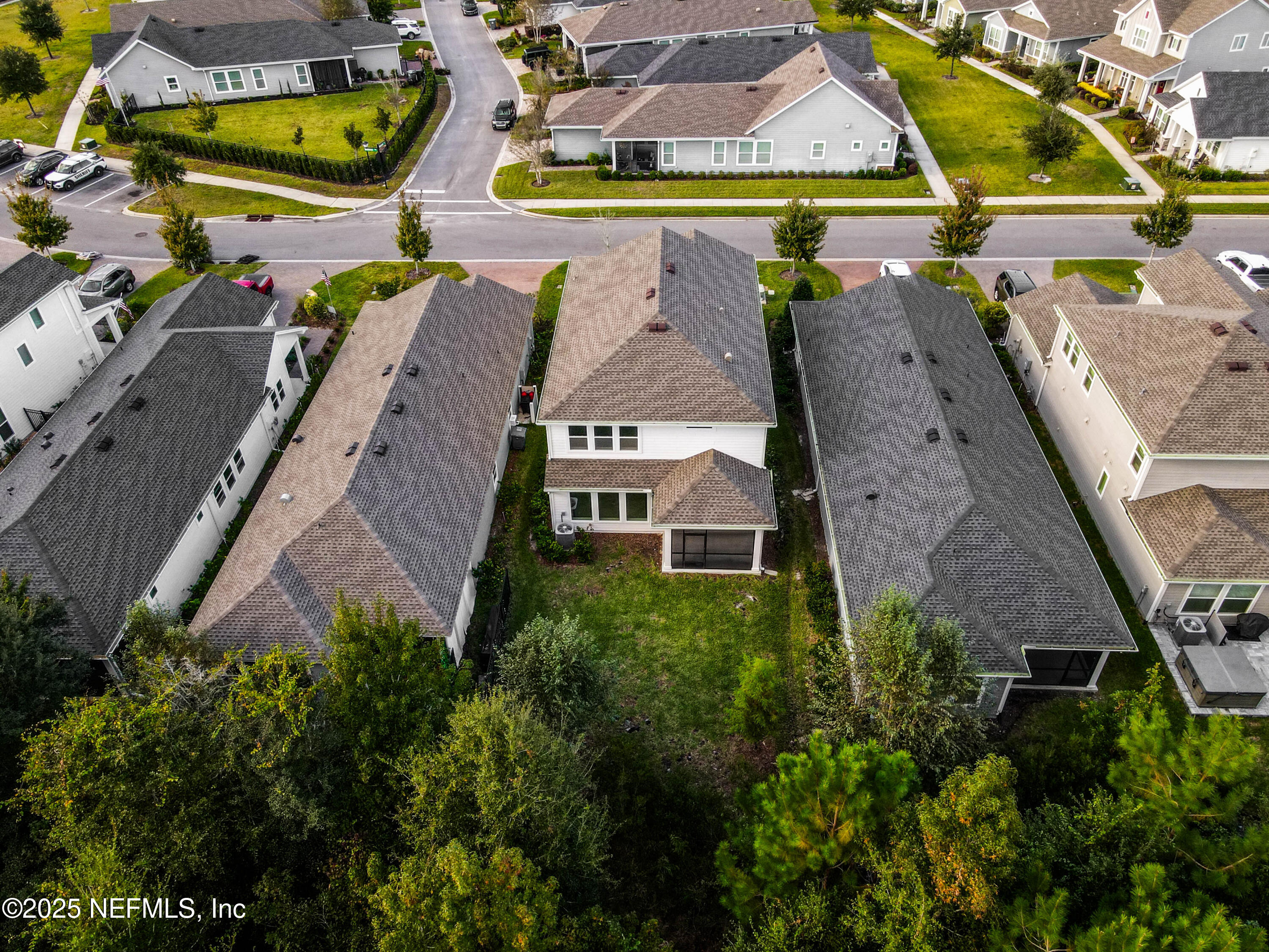111 Windswept Way St. Augustine, FL 32092 - Photo 48 of 63 an aerial view of a house with a swimming pool