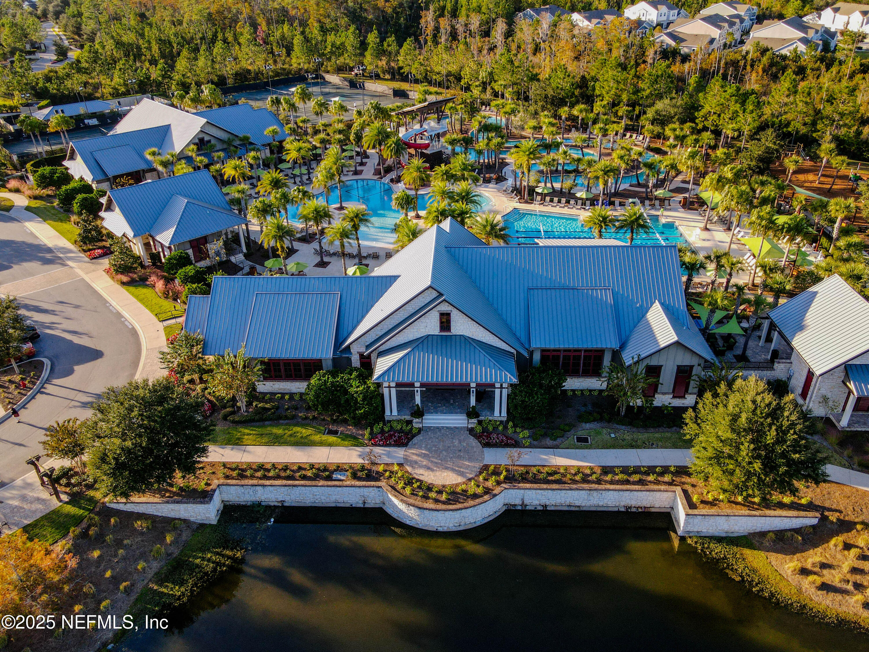 111 Windswept Way St. Augustine, FL 32092 - Photo 49 of 63 an aerial view of a house with swimming pool patio and outdoor seating