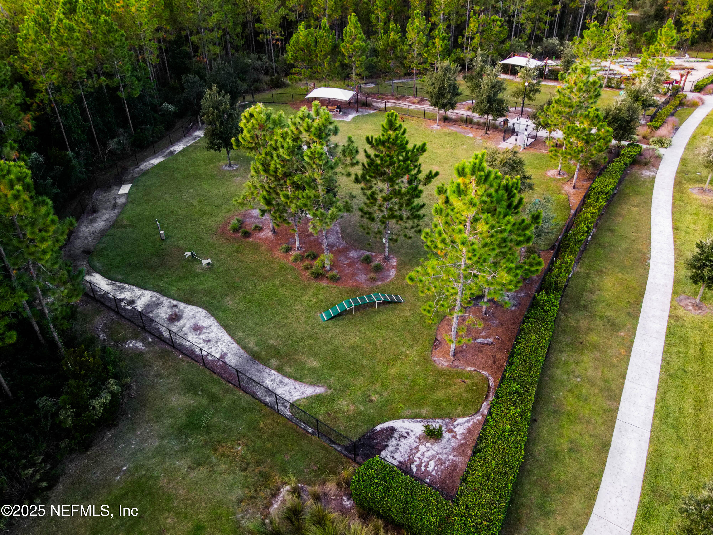 111 Windswept Way St. Augustine, FL 32092 - Photo 62 of 63 a view of a garden with a flower garden