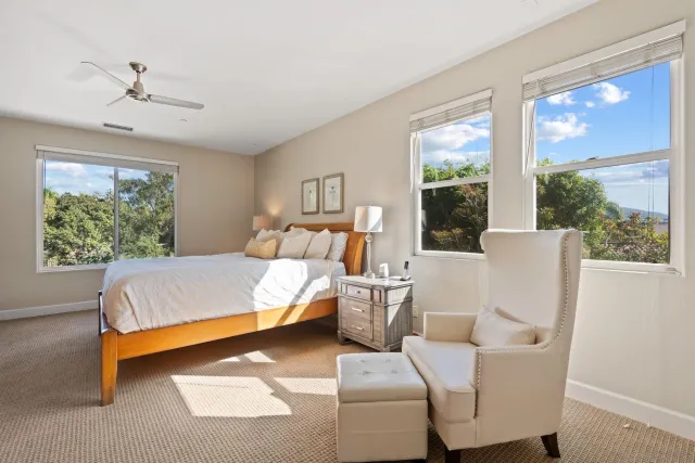 a bathroom with a sink a shower and a mirror