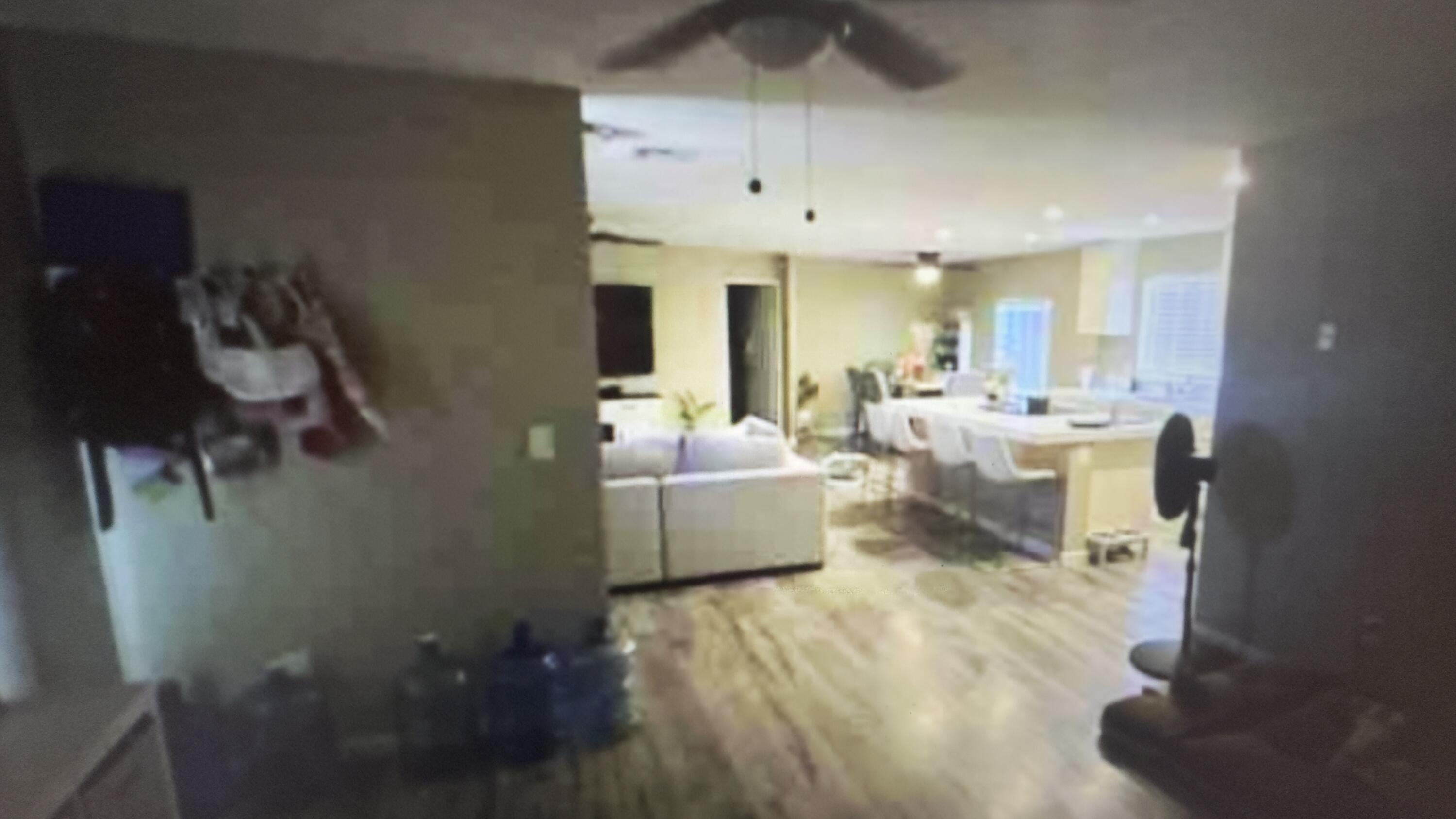 Undisclosed Address Desert Hot Springs, CA 92241 - Photo 18 of 29 a living room with furniture and a flat screen tv