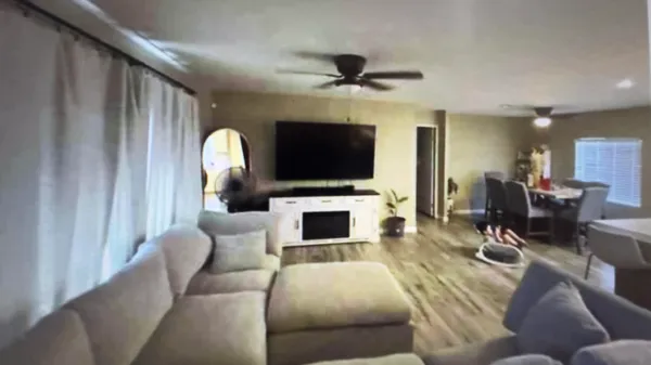 a bathroom with a shower a toilet and a sink