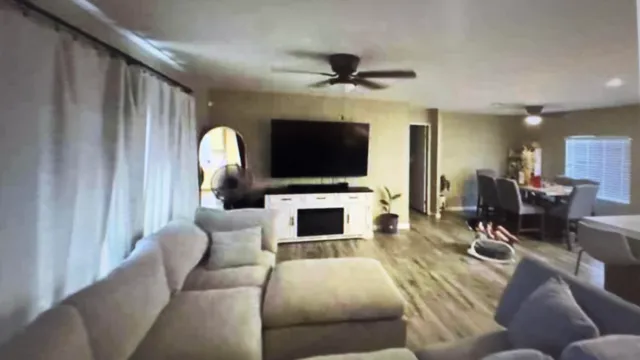 a bathroom with a shower a toilet and a sink