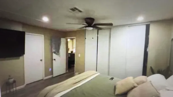 a room with a table and chairs