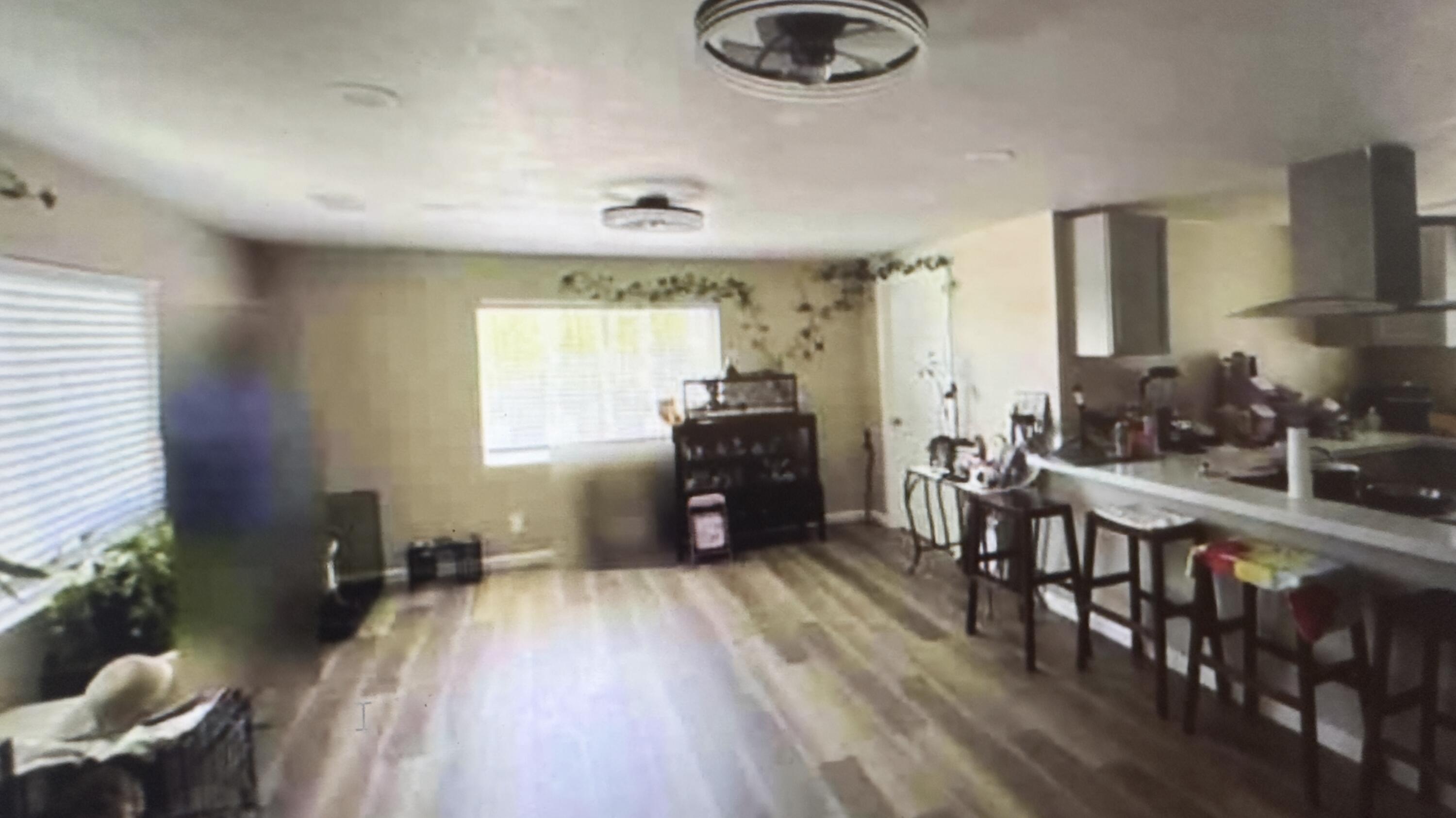 Undisclosed Address Desert Hot Springs, CA 92241 - Photo 4 of 29 a living room with furniture and a wooden floor