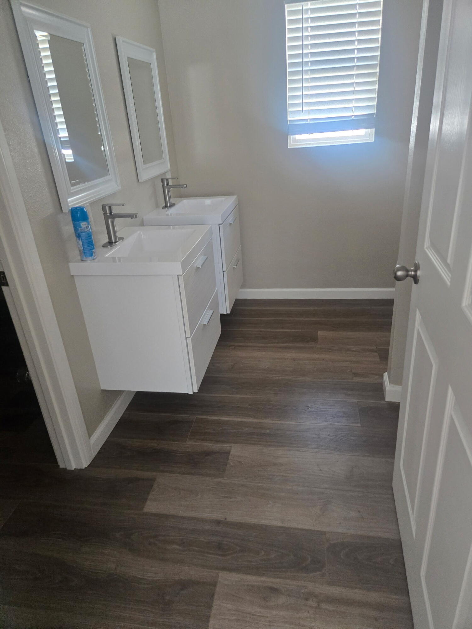 Undisclosed Address Desert Hot Springs, CA 92241 - Photo 10 of 29 a utility room with cabinets and wooden floor