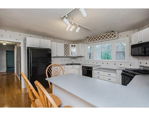 208 Breakneck Road Southbridge, MA 01550 - Photo 13 of 28 a kitchen with granite countertop a refrigerator stove top oven and sink