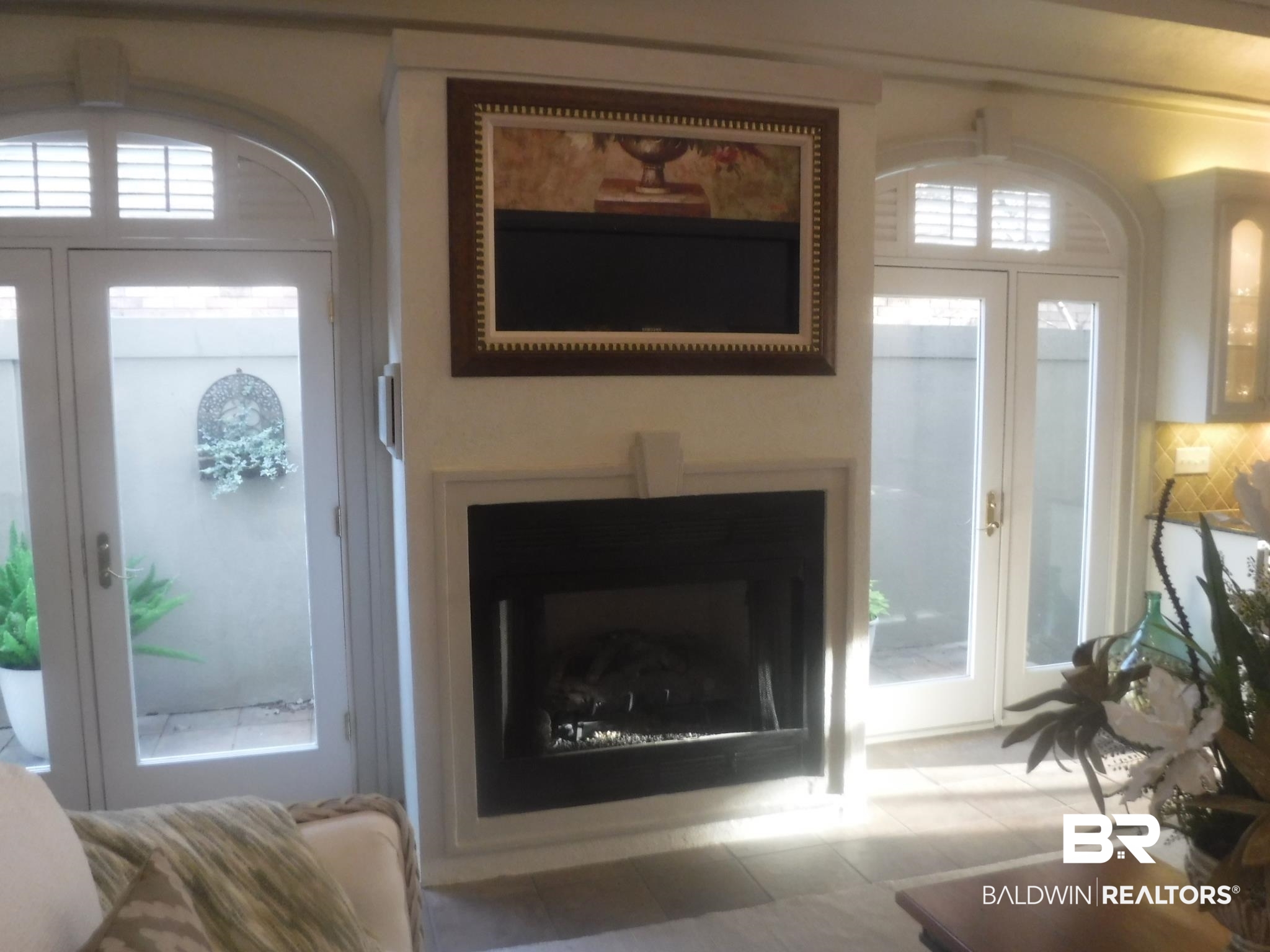 259 South Cedar Street Mobile, AL 36602 - Photo 14 of 27 TV is concealed by replaceable painting