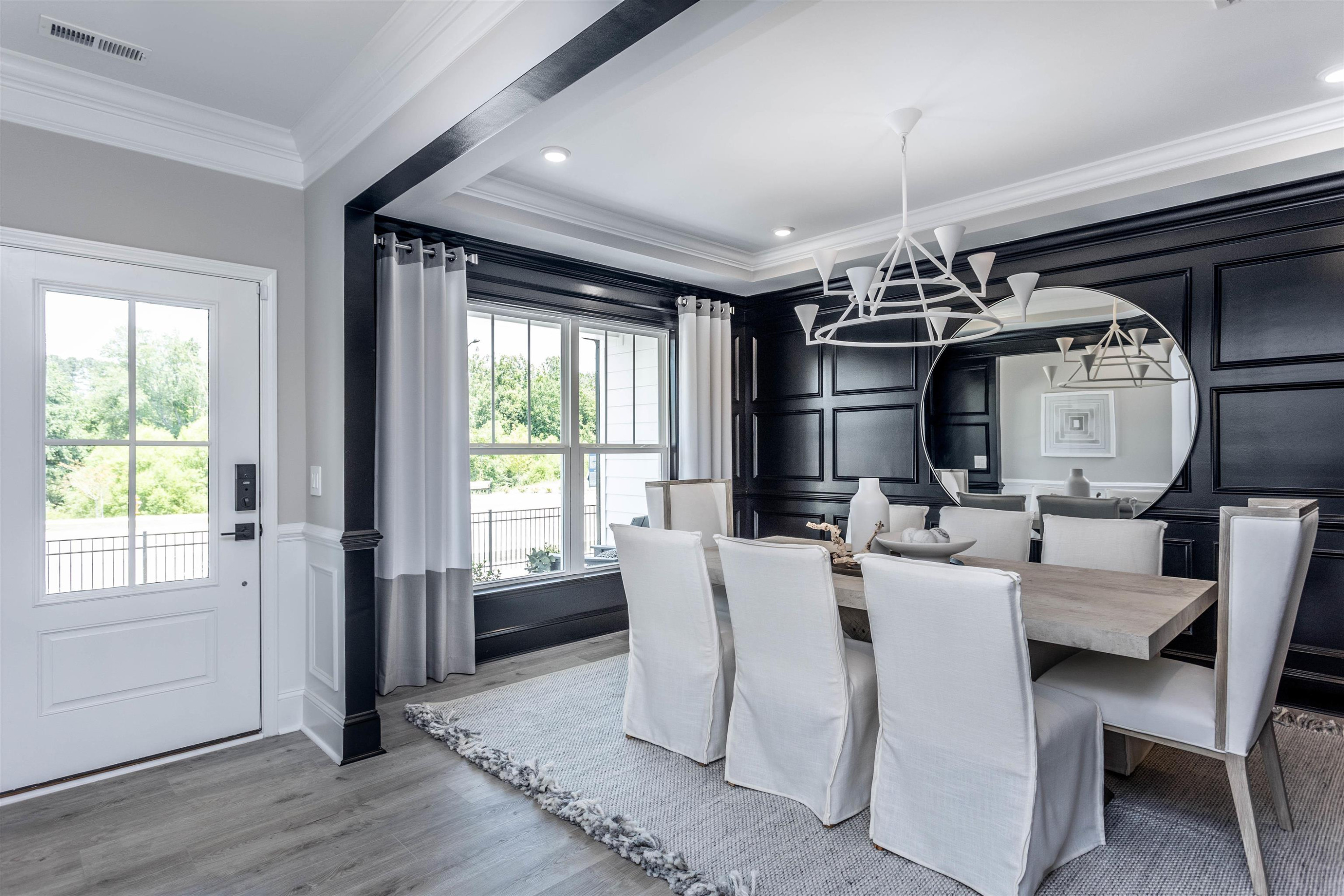 300 Heritage Regency Drive Wake Forest, NC 27587 - Photo 11 of 31 a view of a dining room with furniture window and wooden floor