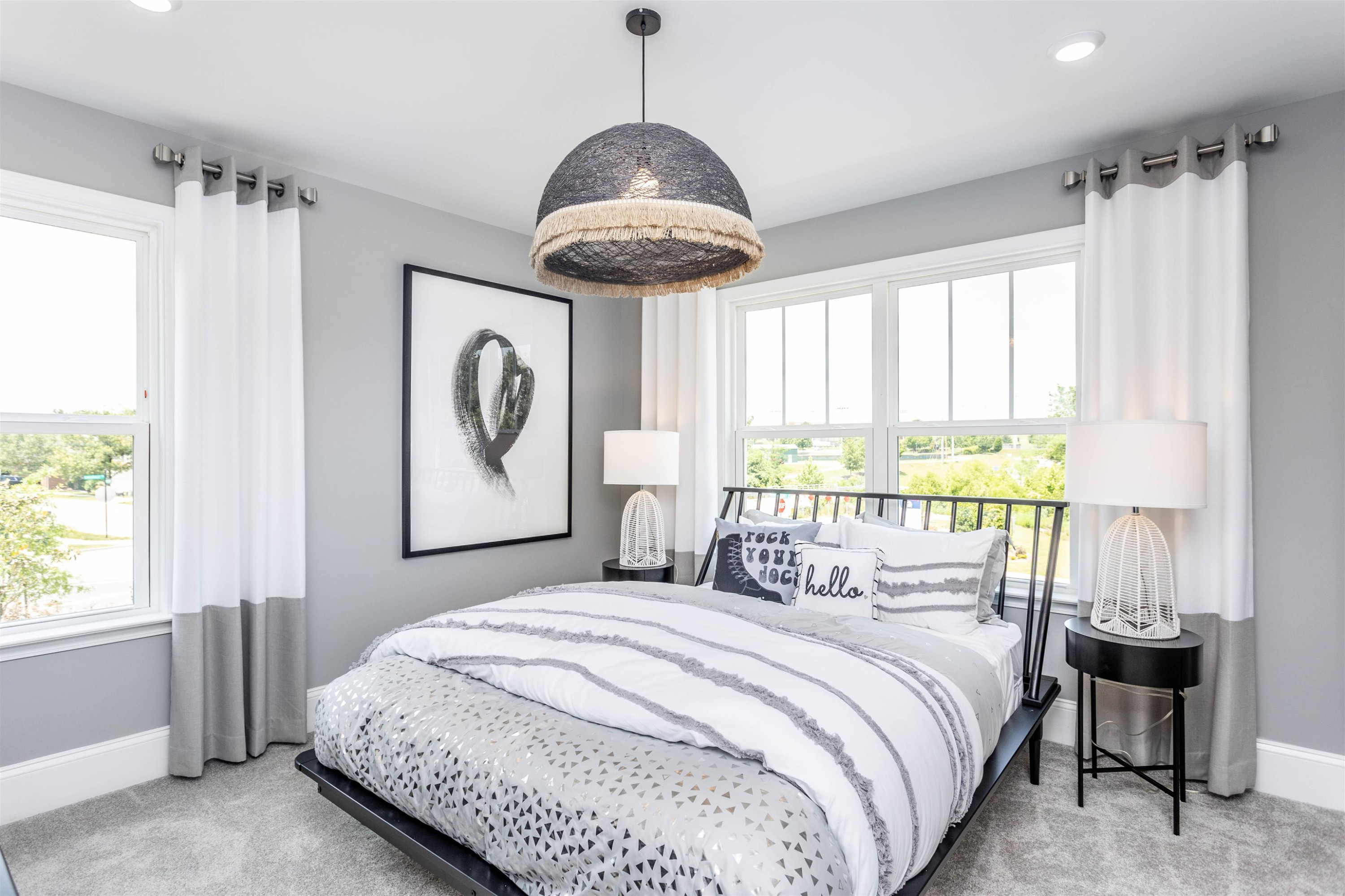 300 Heritage Regency Drive Wake Forest, NC 27587 - Photo 23 of 31 a bedroom with a bed and a chandelier
